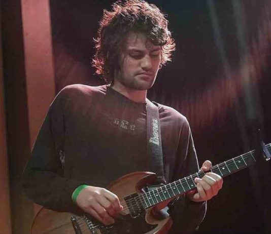 Low-Key Indie Rocker MJ Lenderman Wants to Tell a Bigger Story: Everyday Life Through Music MJ Lenderman performing live, showcasing his down-to-earth storytelling style