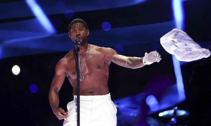 Usher performing live during his 2024 comeback tour.