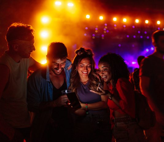 The Impact of Music Festivals on Local Economies: Driving Cultural Tourism and Economic Growth "Music festival attendees driving economic growth through cultural tourism."
