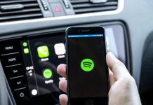 TikTok Music Closure & Impact on Spotify: A Shift in the Streaming Landscape A smartphone displaying the Spotify app on a vibrant background.