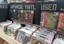 A vintage record player playing a Japanese City Pop vinyl, symbolizing the genre’s global resurgence.